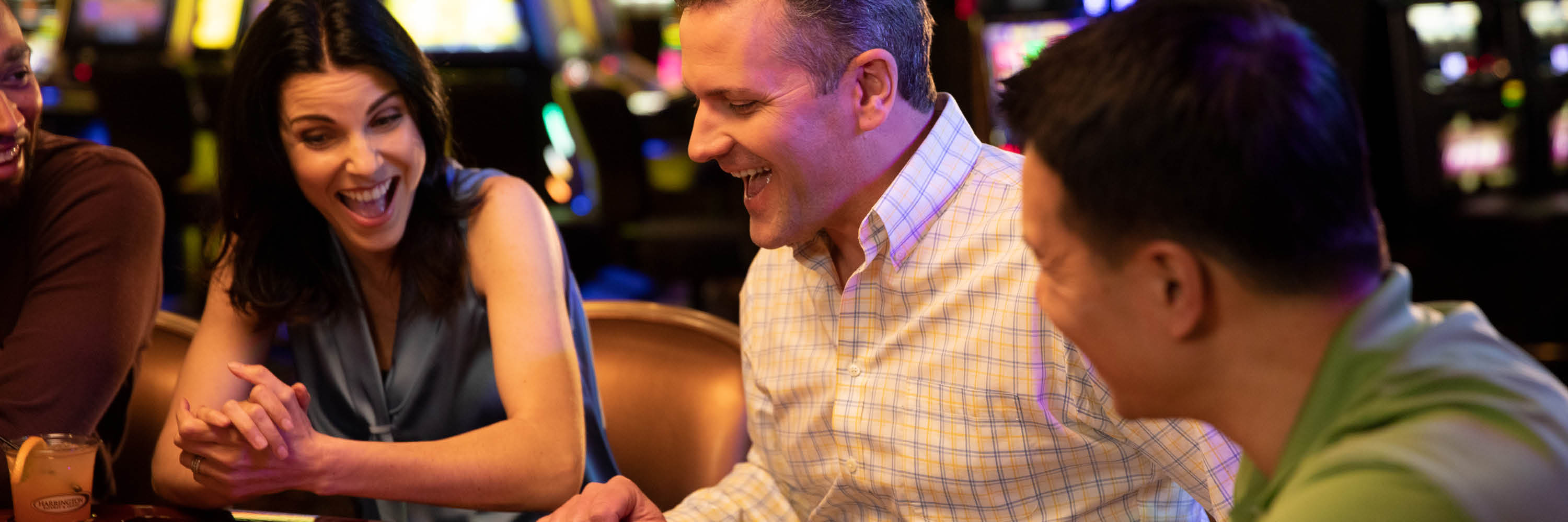 Photo of a man excited playing poker