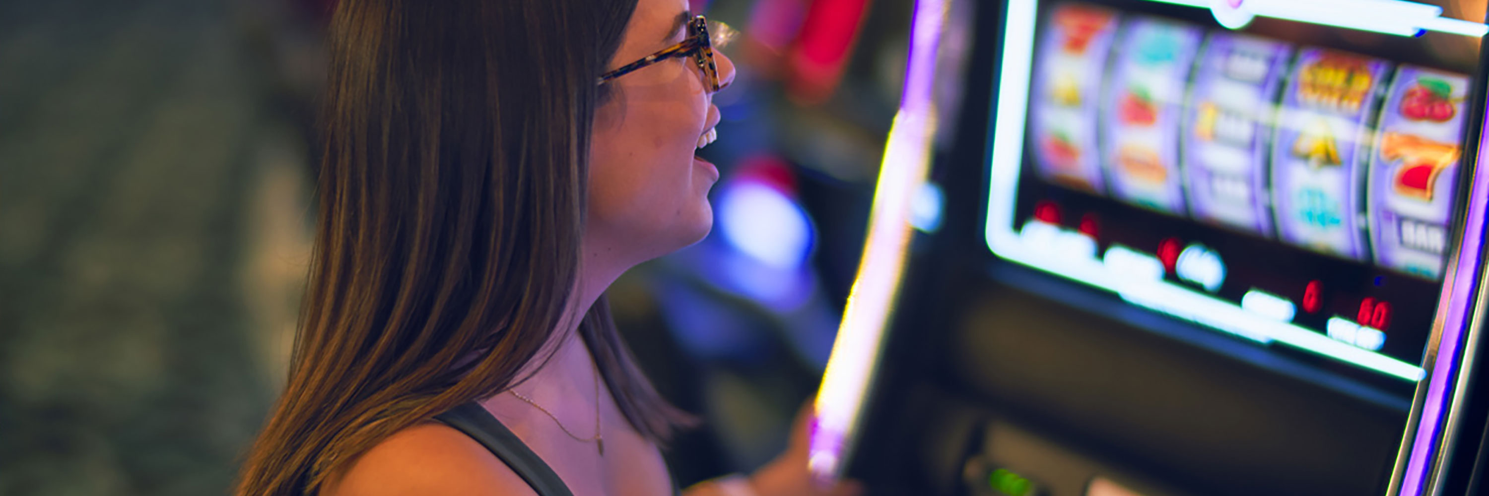 A woman at a slot machine
