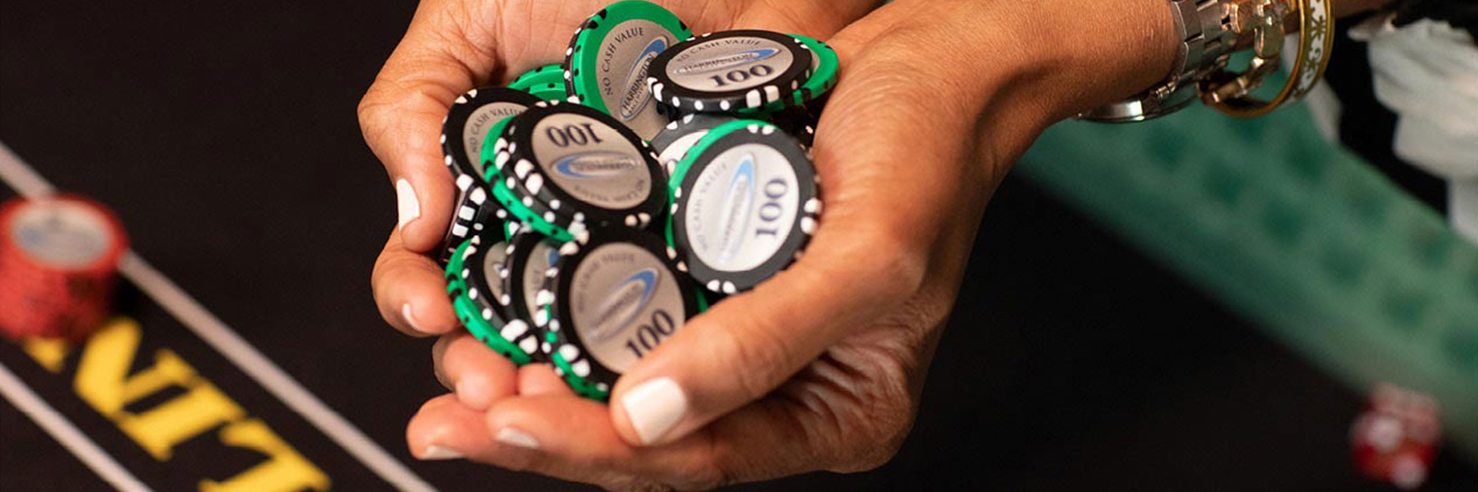 Hands holding poker chips
